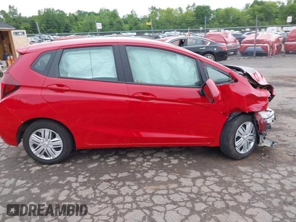 2019 Honda Fit LX z VIN 3HGGK5H43KM727020, wystawiony jako IAAI lot #42372741 z przebiegiem 56 000 mil mil oraz . Historia ofert i sprzedaży dostępna na DreamBid. Obrazek 13.