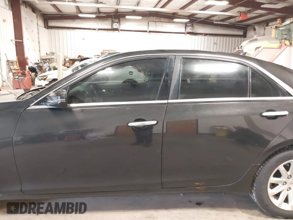 2014 Cadillac CTS Luxury AWD with VIN 1G6AX5S36E0173682, listed as a IAAI auction lot 41538709 with 102,772 mi miles and . Bid and sale history available at DreamBid. Image 15.