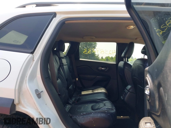 2014 Jeep Cherokee Trailhawk z VIN 1C4PJMBS0EW188976, wystawiony jako IAAI lot #42587233 z przebiegiem 191 670 mil mil oraz . Historia ofert i sprzedaży dostępna na DreamBid. Obrazek 8.