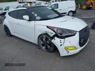 2012 Hyundai Veloster w/Gray Int with VIN KMHTC6AD6CU021176, listed as a IAAI auction lot 42205695 with 93,665 mi miles and . Bid and sale history available at DreamBid. Image 1.