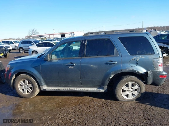 2010 Mercury Mariner with VIN 4M2CN9BG0AKJ02637, listed as a IAAI auction lot 41579241 with 128,095 mi miles. Bid and sale history available at carsss.com. Image 14.