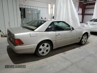 1999 Mercedes-Benz SL-Class with VIN WDBFA68F9XF172312, listed as a Copart auction lot 61248884 with 104,331 mi miles and Salvage Title. Bid and sale history available at carsss.com. Image 3.