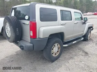 2007 Hummer H3 SUV with VIN 5GTDN13E878254575, listed as a IAAI auction lot 41861673 with 199,212 mi miles. Bid and sale history available at carsss.com. Image 4.