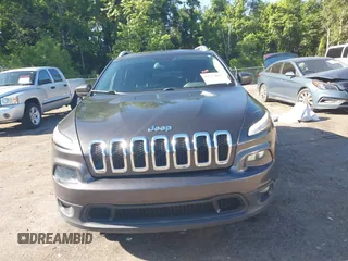 2016 Jeep Cherokee Latitude z VIN 1C4PJLCB6GW159039, wystawiony jako IAAI lot #42274817 z przebiegiem 136 269 mil mil oraz . Historia ofert i sprzedaży dostępna na DreamBid. Obrazek 13.