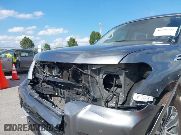 2018 Nissan Armada SL with VIN JN8AY2NC5J9557774, listed as a IAAI auction lot 40205321 with 100,123 mi miles and . Bid and sale history available at DreamBid. Image 6.