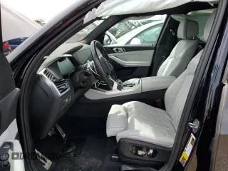 2023 BMW X5 xDrive45e with VIN 5UXTA6C04P9S03633, listed as a Copart auction lot 54916645 with Not provided miles and Salvage title. Bid and sale history available at DreamBid. Image 7.