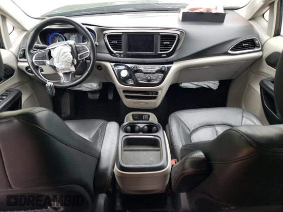 2020 Chrysler Pacifica Touring L with VIN 2C4RC1BG0LR182341, listed as a Copart auction lot 58519235 with 80,212 mi miles and Salvage title. Bid and sale history available at DreamBid. Image 8.
