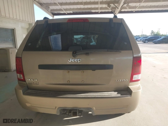 2005 Jeep Grand Cherokee Laredo with VIN 1J8HR48N95C713185, listed as a IAAI auction lot 41777242 with 95,262 mi miles. Bid and sale history available at carsss.com. Image 16.