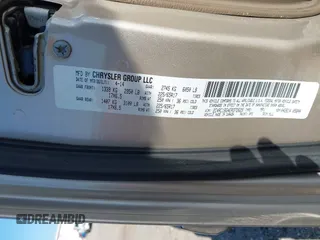 2014 Chrysler Town & Country Touring with VIN 2C4RC1BG4ER372629, listed as a IAAI auction lot 42060762 with 180,662 mi miles. Bid and sale history available at carsss.com. Image 9.