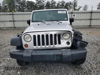 2008 Jeep Wrangler Unlimited X with VIN 1J4GB39148L565250, listed as a Copart auction lot 51170505 with 153,344 mi miles and Salvage Title. Bid and sale history available at DreamBid. Image 5.