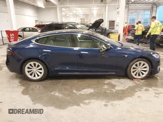 2018 Tesla Model S 75D with VIN 5YJSA1E24JF276044, listed as a IAAI auction lot 41798530 with 53,462 mi miles and . Bid and sale history available at DreamBid. Image 13.
