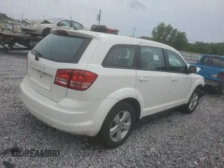 2013 Dodge Journey American Value with VIN 3C4PDCAB3DT516477, listed as a Copart auction lot 56129035 with 181,077 mi miles and Salvage title. Bid and sale history available at DreamBid. Image 3.