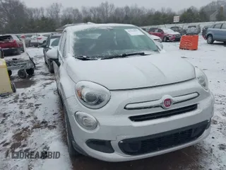 2016 FIAT 500X Easy z VIN ZFBCFYBT6GP369211, wystawiony jako IAAI lot #41561843 z przebiegiem 90 122 mil mil oraz . Historia ofert i sprzedaży dostępna na DreamBid. Obrazek 1.