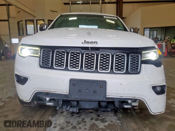 2017 Jeep Grand Cherokee Overland with VIN 1C4RJECG9HC916342, listed as a Copart auction lot 60658285 with 59,470 mi miles and Salvage title. Bid and sale history available at DreamBid. Image 5.