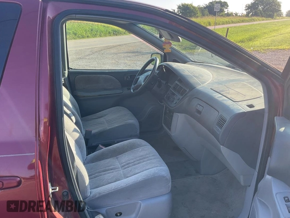 1999 Toyota Sienna LE with VIN 4T3ZF13C5XU141279, listed as a Copart auction lot 64366315 with 218,223 mi miles and Clean title. Bid and sale history available at DreamBid. Image 5.