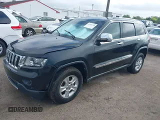 2011 Jeep Grand Cherokee Limited with VIN 1J4RR5GG1BC581520, listed as a IAAI auction lot 41916395 with 151,613 mi miles. Bid and sale history available at carsss.com. Image 2.