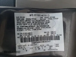 2005 Ford Focus S with VIN 1FAFP34N05W285547, listed as a Copart auction lot 49440865 with 134,354 mi miles and Salvage Title. Bid and sale history available at carsss.com. Image 14.