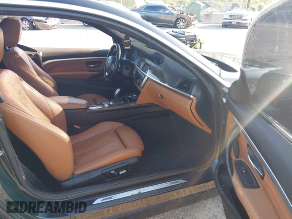 2016 BMW 4 Series 428i with VIN WBA3N7C50GK225853, listed as a IAAI auction lot 42192972 with 109,269 mi miles and . Bid and sale history available at carsss.com. Image 5.