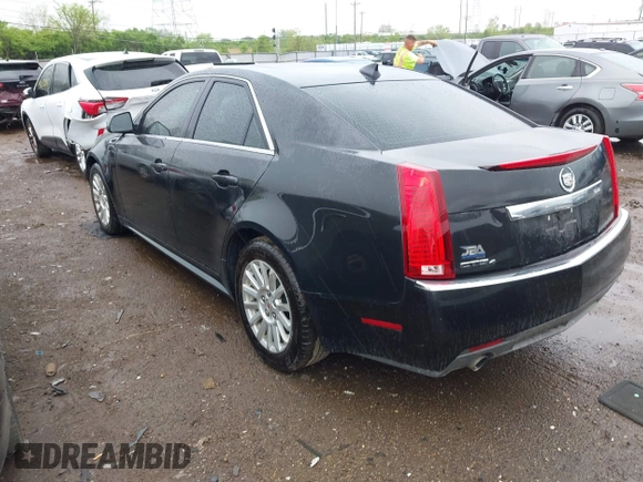 2013 Cadillac CTS Luxury z VIN 1G6DG5E52D0111849, wystawiony jako IAAI lot #42130235 z przebiegiem 129 993 mil mil oraz . Historia ofert i sprzedaży dostępna na DreamBid. Obrazek 3.