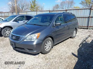 2010 Honda Odyssey EX z VIN 5FNRL3H44AB076668, wystawiony jako IAAI lot #41870491 z przebiegiem 194 387 mil mil oraz . Historia ofert i sprzedaży dostępna na DreamBid. Obrazek 2.