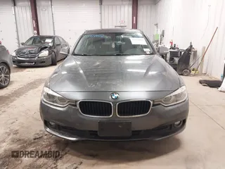 2018 BMW 3 Series 320i xDrive with VIN WBA8E5G50JNU48047, listed as a IAAI auction lot 41564022 with 69,971 mi miles. Bid and sale history available at carsss.com. Image 12.