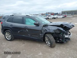2015 Jeep Cherokee Limited with VIN 1C4PJMDS5FW587879, listed as a IAAI auction lot 41864622 with 143,843 mi miles. Bid and sale history available at carsss.com. Image 14.