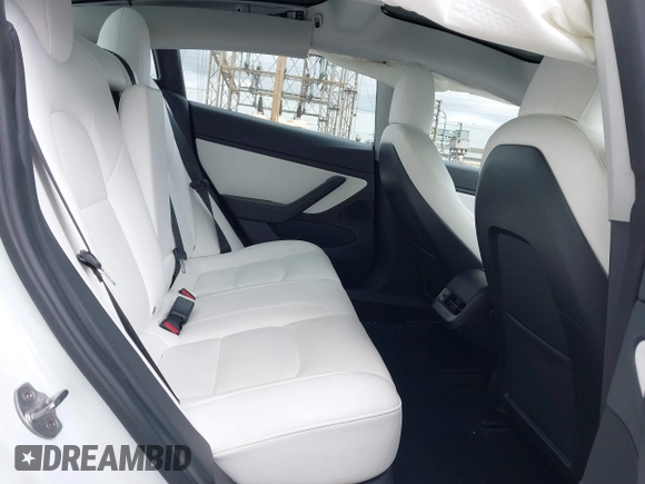 2021 Tesla Model 3 Long Range with VIN 5YJ3E1EB8MF860282, listed as a IAAI auction lot 41787008 with 49,730 mi miles and . Bid and sale history available at DreamBid. Image 8.