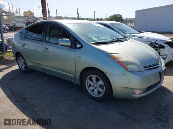 2007 Toyota Prius z VIN JTDKB20U877556527, wystawiony jako IAAI lot #41965245 z przebiegiem 259 572 mil mil oraz . Historia ofert i sprzedaży dostępna na DreamBid. Obrazek 1.