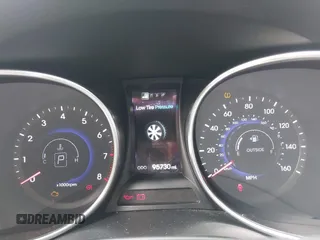 2013 Hyundai Santa Fe Sport z VIN 5XYZUDLA3DG114436, wystawiony jako IAAI lot #42084871 z przebiegiem 96 000 mil mil oraz . Historia ofert i sprzedaży dostępna na DreamBid. Obrazek 7.
