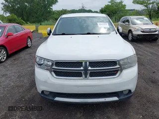 2013 Dodge Durango Crew with VIN 1C4RDJDG9DC667338, listed as a IAAI auction lot 42639559 with 137,020 mi miles and . Bid and sale history available at DreamBid. Image 12.
