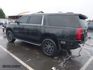 2017 Chevrolet Suburban Premier with VIN 1GNSKJKC4HR162261, listed as a IAAI auction lot 41593672 with 100,136 mi miles. Bid and sale history available at carsss.com. Image 3.