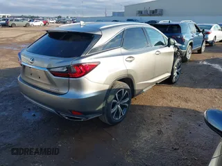 2022 Lexus RX with VIN 2T2HZMAA8NC232720, listed as a IAAI auction lot 41133110 with 33,282 mi miles. Bid and sale history available at carsss.com. Image 4.