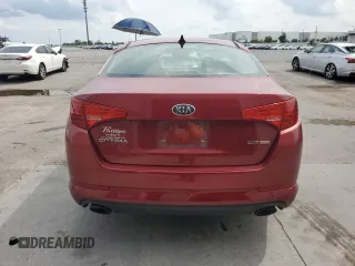 2013 Kia Optima EX z VIN 5XXGN4A7XDG169353, wystawiony jako Copart lot #55784855 z przebiegiem 92 809 mil mil oraz Szkoda całkowita • Salvage title. Historia ofert i sprzedaży dostępna na DreamBid. Obrazek 6.