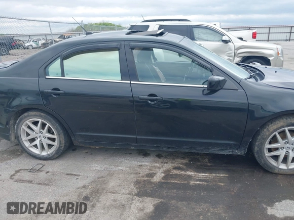 2012 Ford Fusion SEL z VIN 3FAHP0JA6CR363421, wystawiony jako IAAI lot #42552226 z przebiegiem 132 627 mil mil oraz . Historia ofert i sprzedaży dostępna na DreamBid. Obrazek 13.