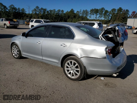 2006 Volkswagen Jetta Sedan 2.0L Turbo with VIN 3VWMJ71KX6M658032, listed as a Copart auction lot 76093844 with 289,915 mi miles and Salvage Title. Bid and sale history available at carsss.com. Image 2.