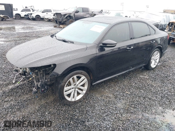 2019 Volkswagen Passat 2.0T Wolfsburg Edition with VIN 1VWLA7A39KC011539, listed as a IAAI auction lot 41616136 with 54,652 mi miles. Bid and sale history available at carsss.com. Image 2.