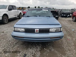 1993 Oldsmobile Cutlass Ciera S z VIN 1G3AG55N9P6451968, wystawiony jako Copart lot #72746634 z przebiegiem 88 151 mil mil oraz Szkody całkowita. Historia ofert i sprzedaży dostępna na DreamBid. Obrazek 5.
