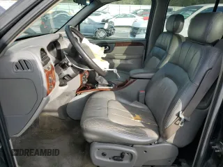 2003 GMC Envoy SLT with VIN 1GKET16S036127025, listed as a Copart auction lot 73971234 with 229,326 mi miles and Clean Title. Bid and sale history available at DreamBid. Image 7.