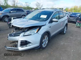 2015 Ford Escape Titanium z VIN 1FMCU9J99FUC75852, wystawiony jako IAAI lot #42171467 z przebiegiem 113 322 mil mil oraz . Historia ofert i sprzedaży dostępna na DreamBid. Obrazek 17.
