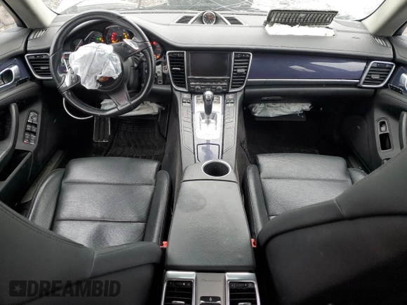 2015 Porsche Panamera 4 z VIN WP0AA2A72FL000789, wystawiony jako Copart lot #51923145 z przebiegiem 138 411 mil mil oraz Szkoda całkowita • Salvage title. Historia ofert i sprzedaży dostępna na DreamBid. Obrazek 8.