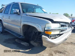 2004 Chevrolet Tahoe LS with VIN 1GNEC13T64J282970, listed as a IAAI auction lot 41879458 with 205,952 mi miles and . Bid and sale history available at DreamBid. Image 6.