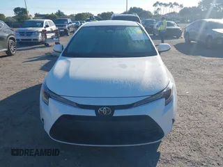 2024 Toyota Corolla LE with VIN 5YFB4MDE7RP218014, listed as a IAAI auction lot 41470209 with 10,877 mi miles. Bid and sale history available at carsss.com. Image 13.