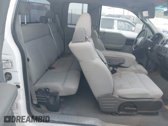 2005 Ford F-150 STX with VIN 1FTRX12W85NB75651, listed as a IAAI auction lot 41789580 with 235,133 mi miles. Bid and sale history available at carsss.com. Image 8.