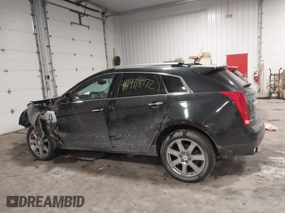 2011 Cadillac SRX Performance Collection with VIN 3GYFNEEY9BS533994, listed as a IAAI auction lot 40990072 with 168,134 mi miles. Bid and sale history available at carsss.com. Image 15.