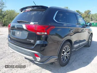 2016 Mitsubishi Outlander GT with VIN JA4JZ4AX0GZ017846, listed as a IAAI auction lot 41900962 with 117,604 mi miles and . Bid and sale history available at DreamBid. Image 4.