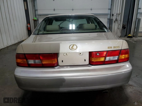 1999 Lexus ES 300 Luxury Sport Sdn with VIN JT8BF28G4X0167068, listed as a Copart auction lot 79450924 with 0 mi miles and Salvage Title. Bid and sale history available at carsss.com. Image 6.