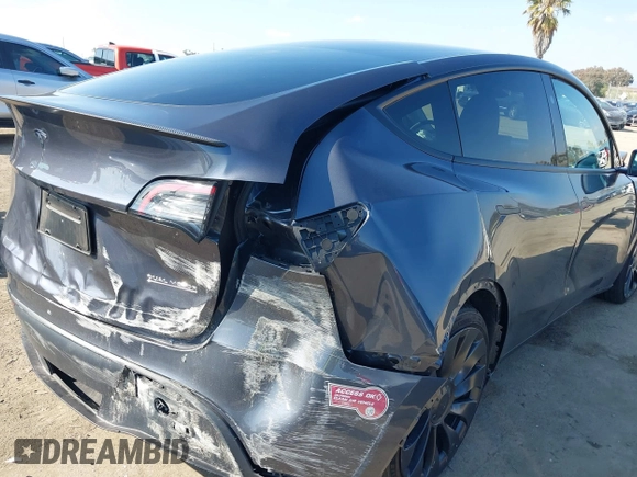 2023 Tesla Model Y Performance with VIN 7SAYGDEF5PF823122, listed as a IAAI auction lot 41546480 with 12,943 mi miles and . Bid and sale history available at DreamBid. Image 6.