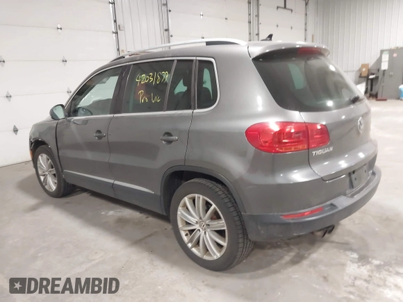 2012 Volkswagen Tiguan S with VIN WVGBV7AX2CW002991, listed as a IAAI auction lot 42031877 with 205,979 mi miles and . Bid and sale history available at DreamBid. Image 3.