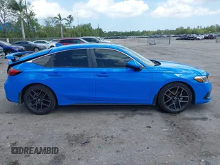 2023 Honda Civic Sport Touring z VIN 19XFL1H84PE002868, wystawiony jako IAAI lot #41978174 z przebiegiem 42 604 mil mil oraz . Historia ofert i sprzedaży dostępna na DreamBid. Obrazek 13.
