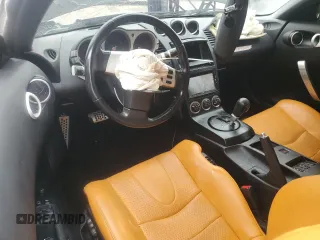 2004 Nissan 350Z Touring with VIN JN1AZ34D04T160475, listed as a Copart auction lot 59435035 with 122,875 mi miles and Salvage title. Bid and sale history available at DreamBid. Image 8.